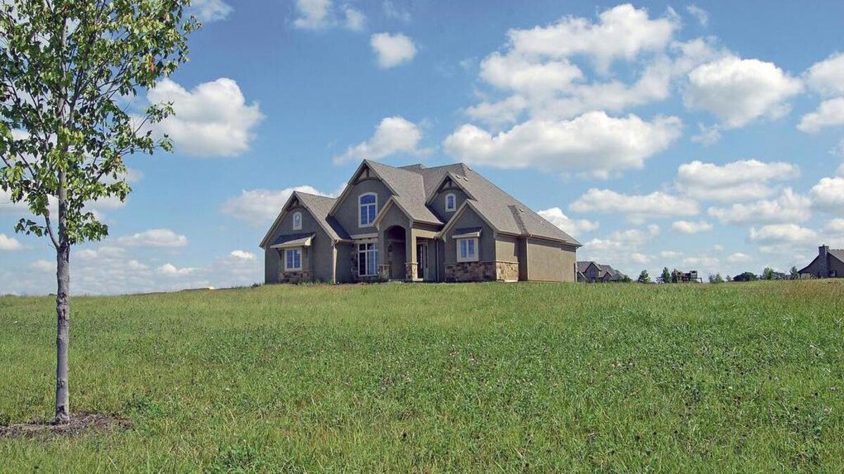 
This Remington plan by Woodbridge Homes is nearing completion in Southwick on the Lake.
