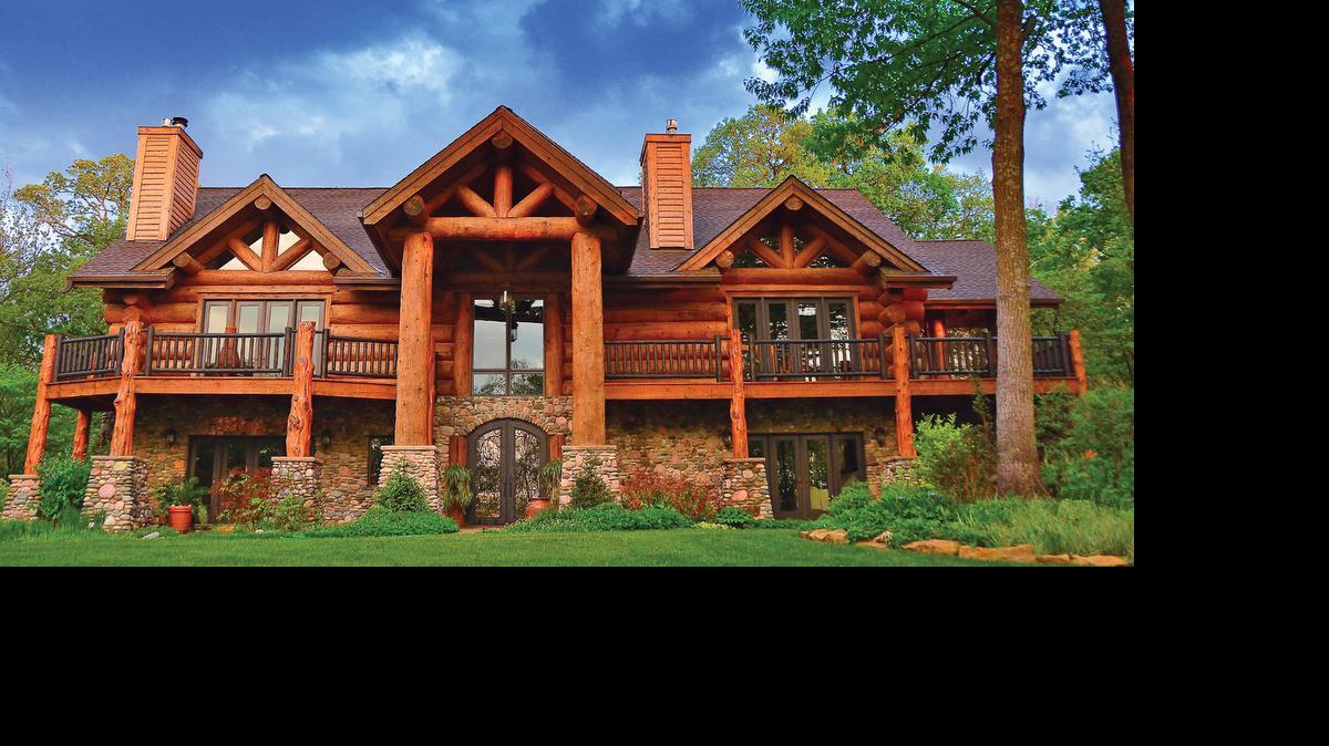 
This distinctive, serene log home retreat, listed at $1,295,000, rests upon the high point of 10 acres surrounded by a hickory, white oak, walnut and redbud forest offering absolute privacy.
