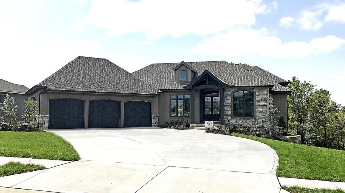 Several homes are available for immediate occupancy in Cedar Creek, including this stately Pinebrook National floor plan from C&M Builders in Hidden Lake Estates. The home is located at 25207 W. 105th Terrace and priced at $879,445.