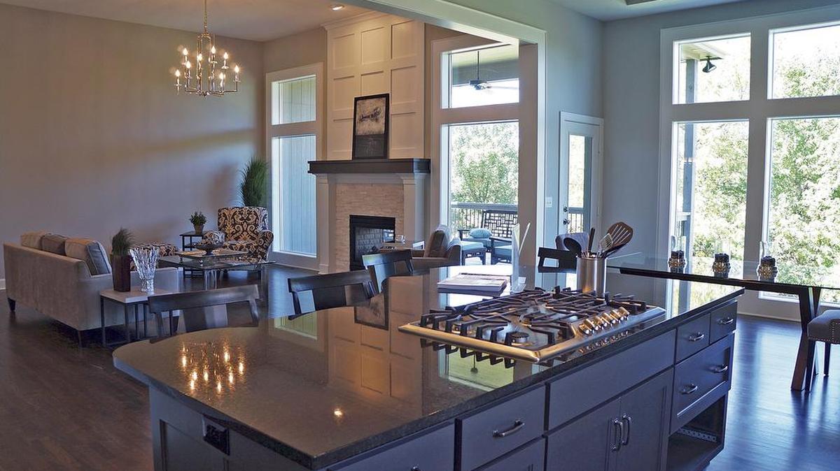 
Sleek, modern interior finishes are shown in the Kensington Reverse 1
1/2-story by Don Julian Builders Inc. at 13112 W. 170th St. It features four bedrooms, 3
1/2 baths, a four-car garage and a covered deck and is available at $529,900.

