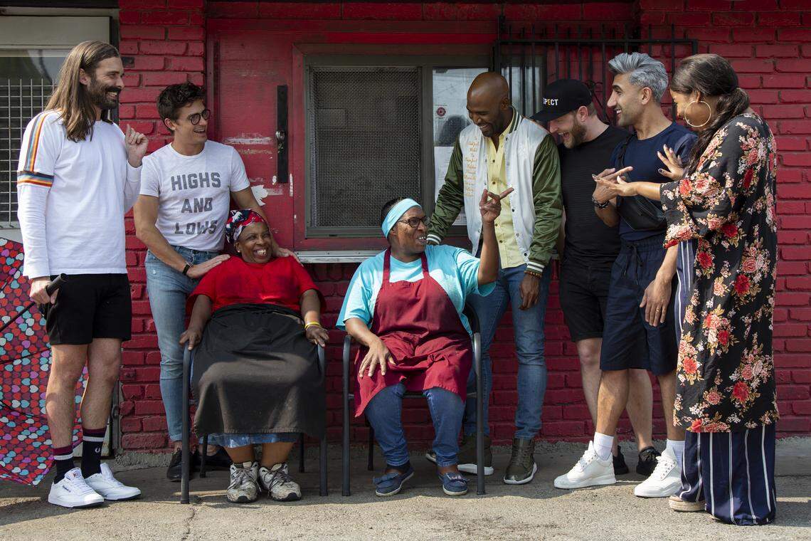 The Fab Five visiting with sisters and barbecue pitmasters Deborah Jones and Mary Jones Mosley before their makeover.