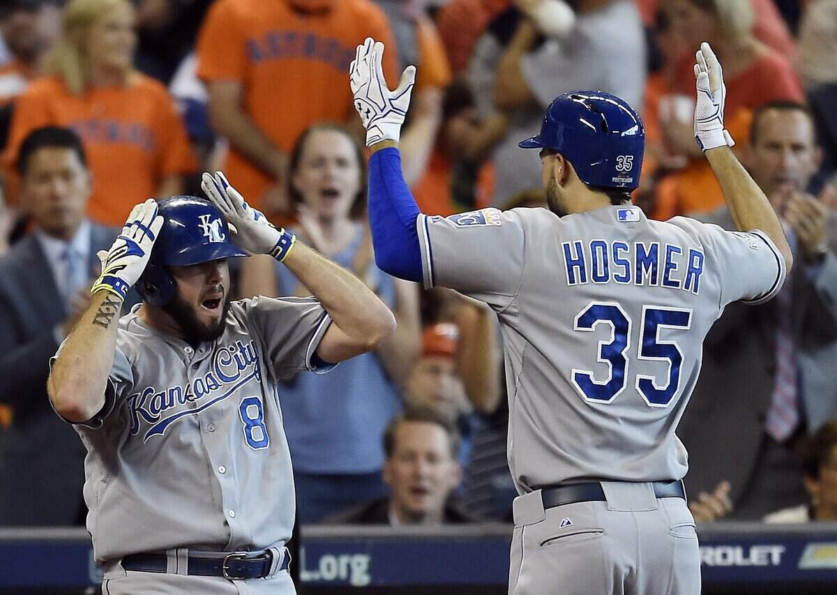 Kansas City Royals third baseman Mike Moustakas celebrated with first baseman Eric Hosmer after Hosmer hit a two-run homer in the ninth inning during Monday’s ALDS baseball game on October 12, 2015 at Minute Maid Park in Houston, Texas.