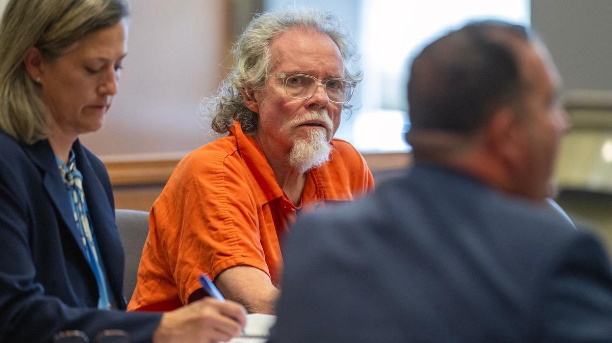 Amy Thompson, left, a public defender, appears with her client Larry Acree at a hearing Wednesday at the Eastern Jackson County Courthouse in Independence. It was Acree’s first court appearance since prosecutors announced they will seek the death penalty for Acree, who’s accused of fatally shooting Independence police officer Cody Allen and process server Drexel Mack during an eviction on Feb. 29.