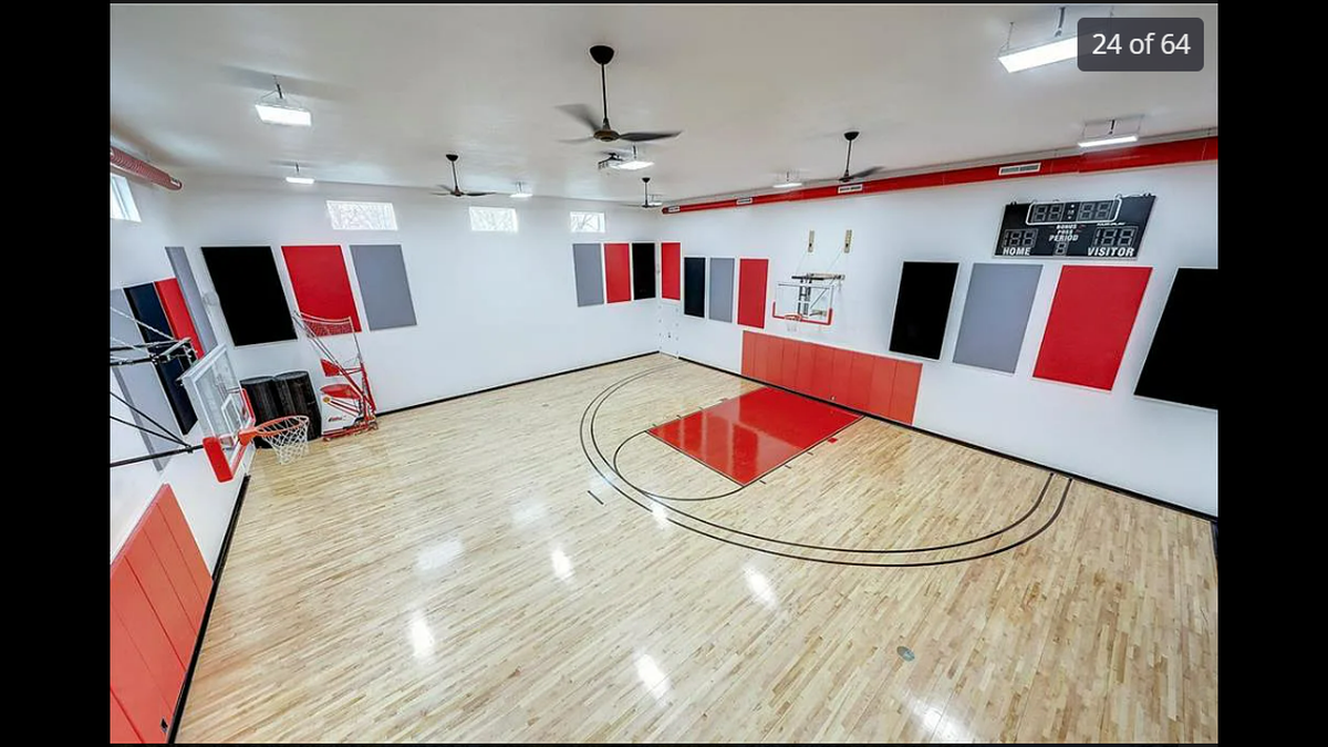 The listing of 9925 W. 159th St. in Overland Park features an 3,000-square-foot indoor basketball court.