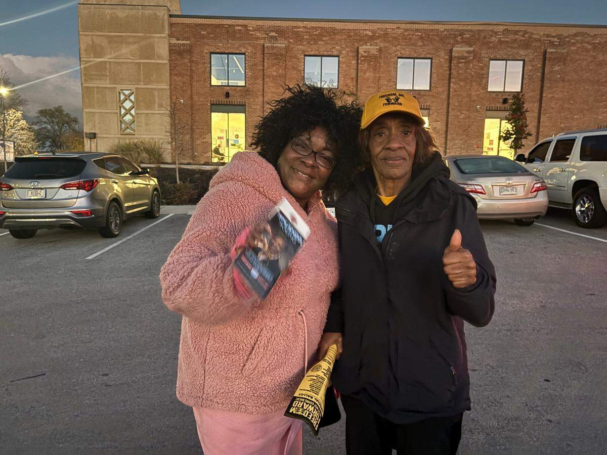 Rita Williams, 70, on the left, said she voted early for Vice President Kamala Harris because she believes it’s time for a woman to take charge of the country.&nbsp;Latina Mitchell, 55, on the right, said she voted for Harris because she believes the country needs a change.