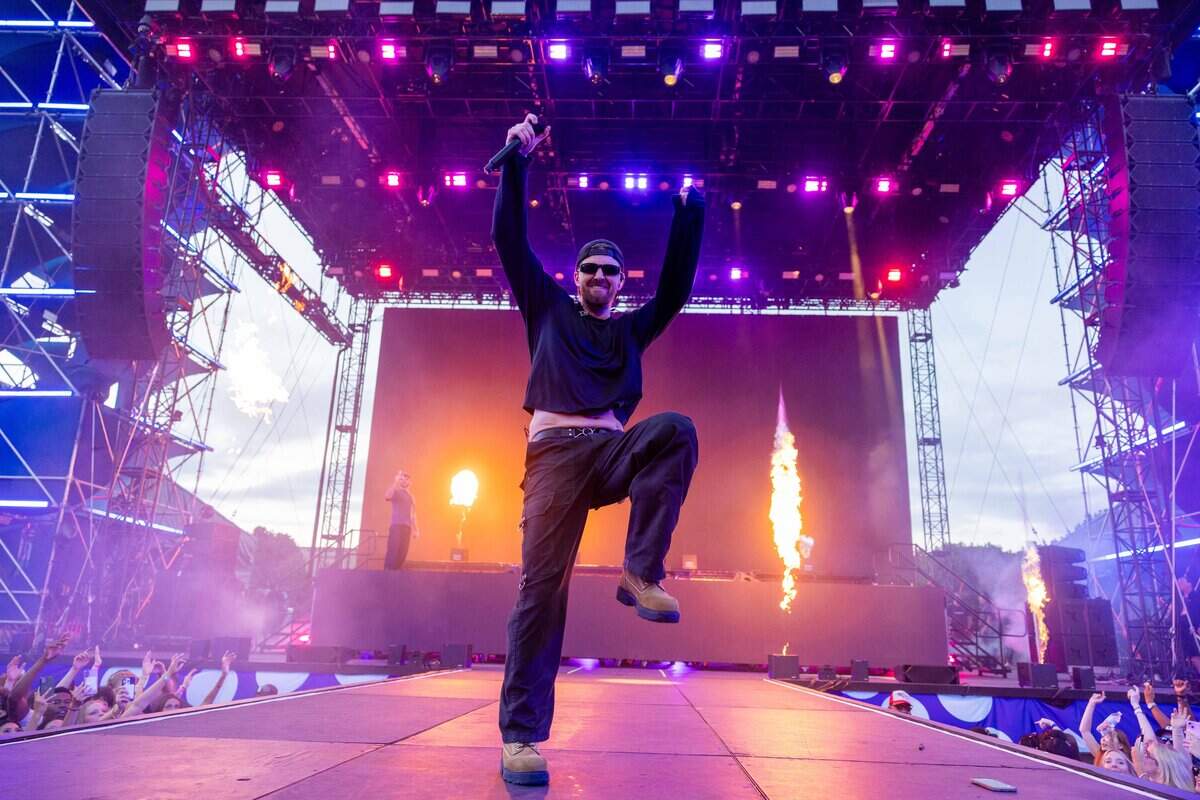 Andrew Taggart dances across the stage during the FIFA Fan Fest Chainsmokers concert at Fan Fest on Sunday, June 21, 2026.