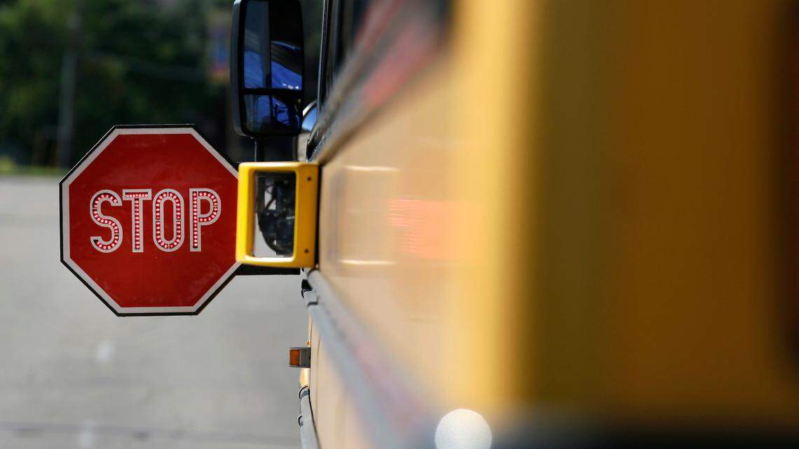 In Indiana, “if a school bus stops on a two lane road and the red flashing lights are activated and the stop arm is extended, all motorists MUST stop.”