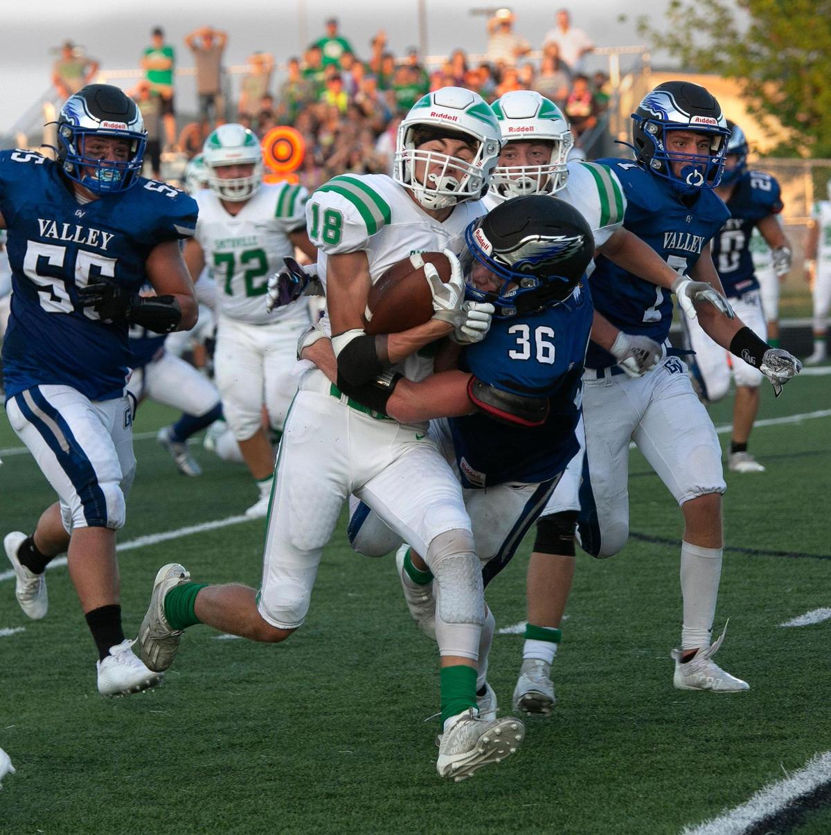 Grain Valley’s Elijah Moore (right) tried to stop . Smithvilles’s Max McKenzie during Friday’s game at Grain Valley, August 27, 2021.