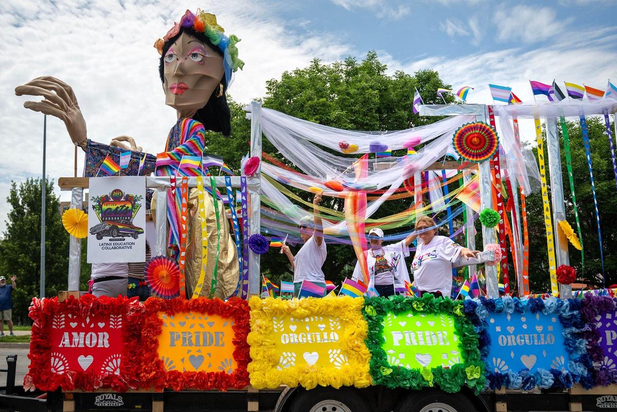 The float for the Latino Arts Foundation featured a bigger-than lifesize puppet which rode down the street during the KC Pride Parade on Saturday, June 8, 2024, in Kansas City.