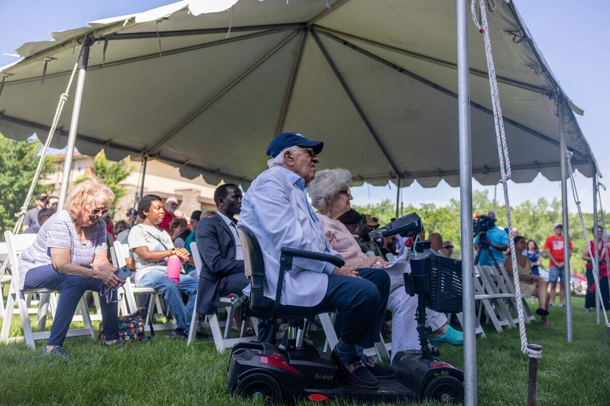 The crowd watches the ribbon cutting ceremony at St. Michael's Veterans Center on Monday, June 29, 2026. Valor House, the final residential building in St. Michael's Veterans Center's original campus master plan, adds 62 affordable apartment homes, expanding the campus to 179 permanent housing units for veterans experiencing homelessness or disabilities in the Kansas City area.