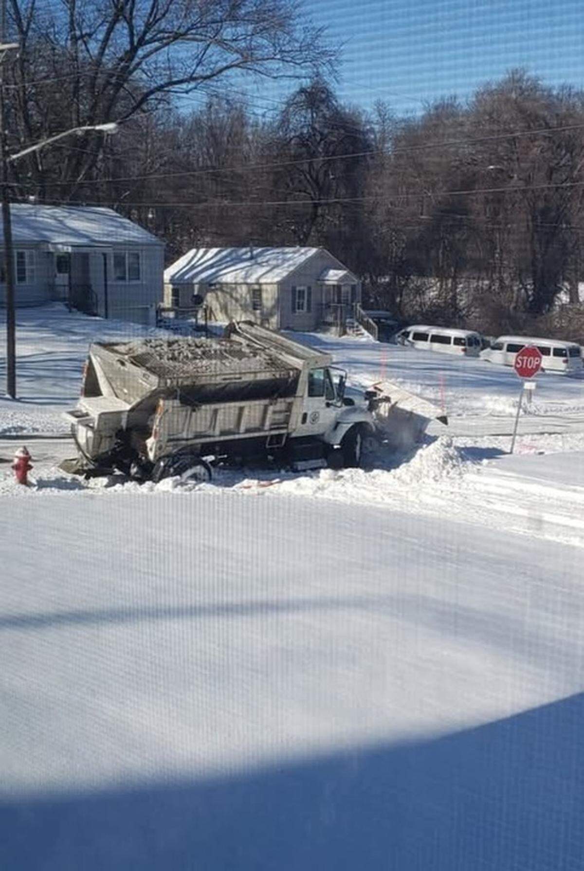 A snow plow truck gets stuck in Rivera’s neighborhood.