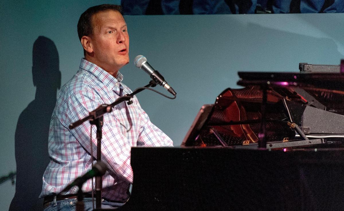 Alan Stribling, prime owner of the Uptown Lounge, 3400 Main St., plays and sings a duet with bartender Vonne Whitman. A pianist and singer for more than 30 years, Stribling, 56, opened the piano bar in June 2022 where Davey’s Uptown Rambler’s Club once stood.