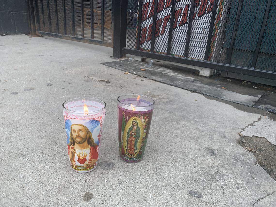 Candles were left outside the Tequila KC Bar after a shooting killed four Sunday morning.