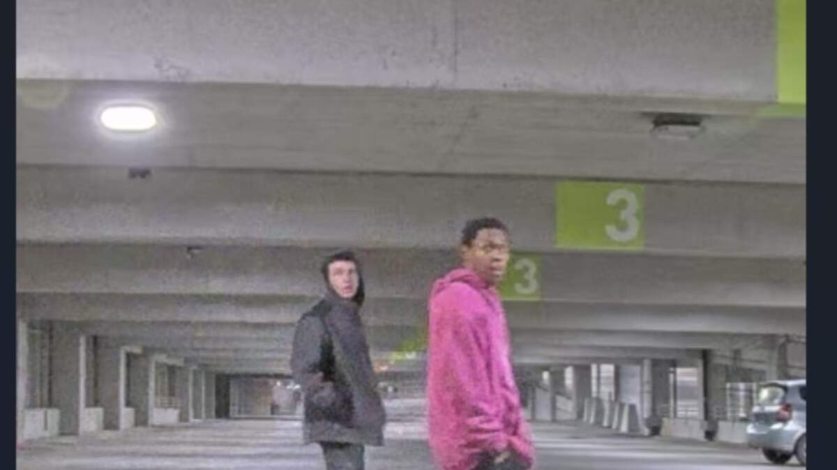 Surveillance photo of two suspects believed to be involved in the vandalism of around 20 cars in a city-owned downtown Kansas City parking garage, located at 1120 Oak St., that occured on Nov. 28.  