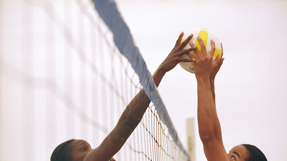 A group playing pickup sandlot volleyball in Independence on Sundays invited Mará Rose Williams to join.