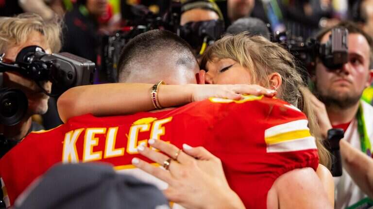 Mic’d-up video shows what Travis Kelce told Taylor Swift on field after Super Bowl