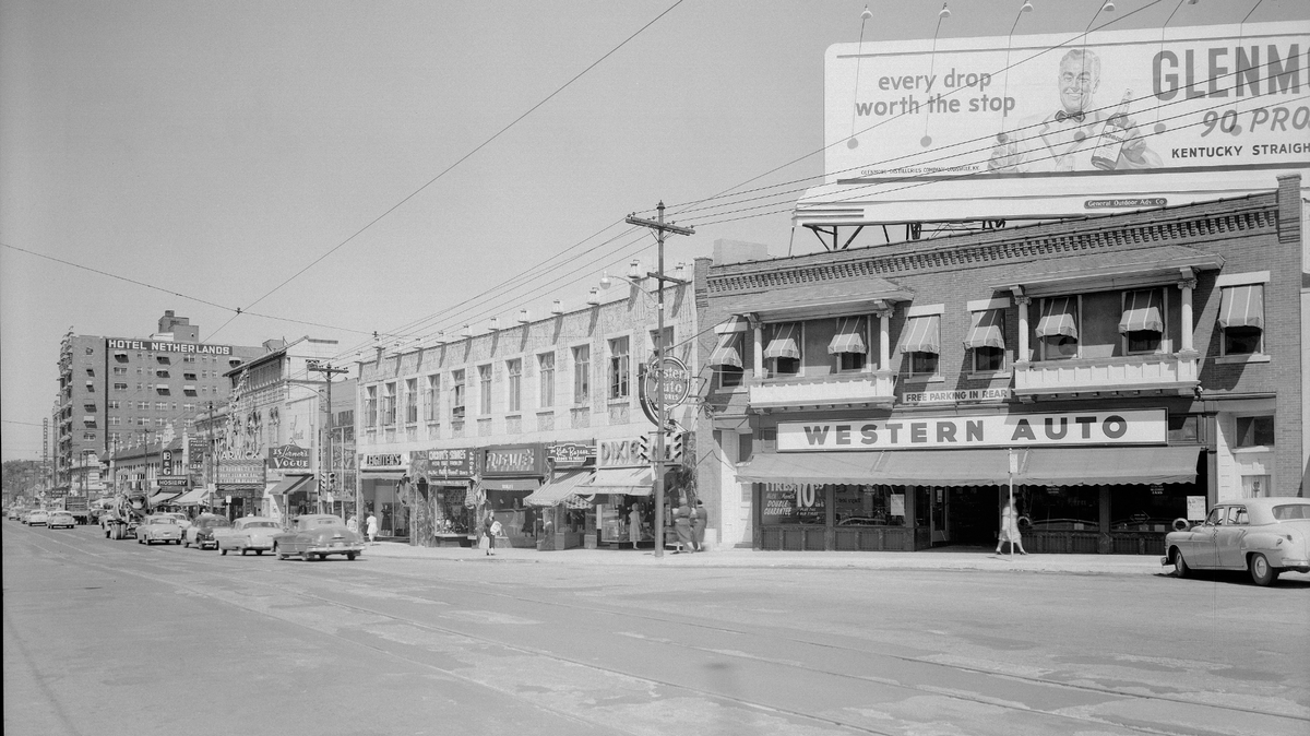 Main Street in 1952, with the Warwick Theatre in the far left. Provided by Missouri Valley Special Collections, Kansas City Public Library in Kansas City, Missouri.