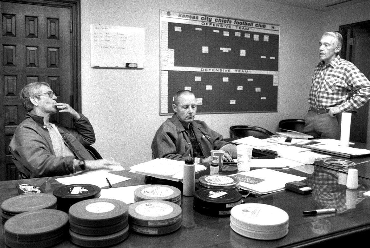 Chiefs assistant Tom Bresnahan, J.D. Helm and head coach Marv levy fine-tune their game plan for New Orleans in 1982.