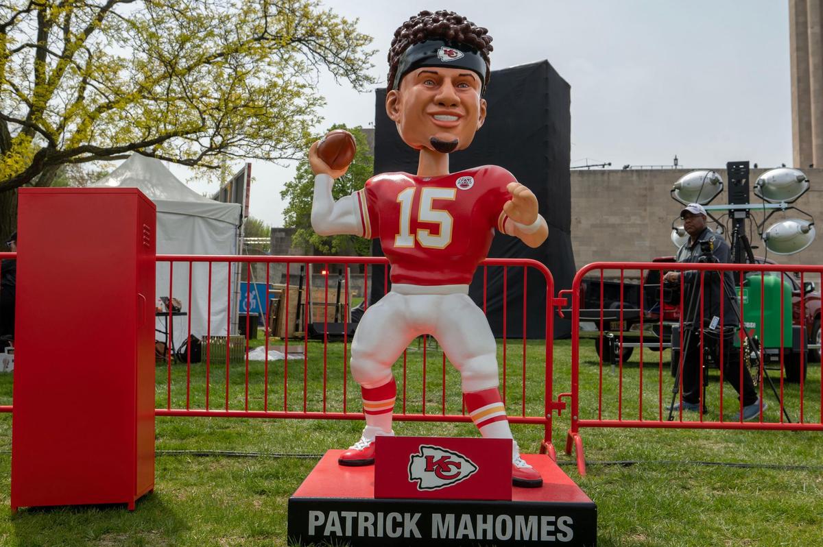 A giant bobble head statue of Kansas City Chiefs quarterback Patrick Mahomes is displayed at the Chiefs Kingdom Experience Wednesday at the NFL Draft preview.
