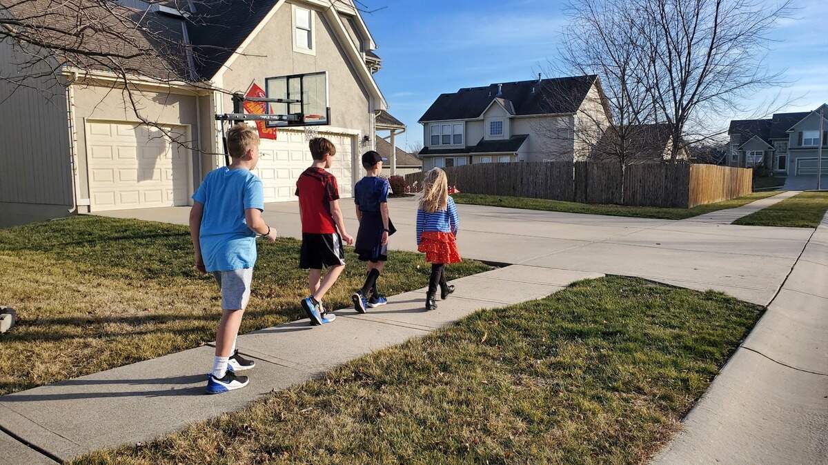 Teach kids the “rules of the road” before they head out to walk.