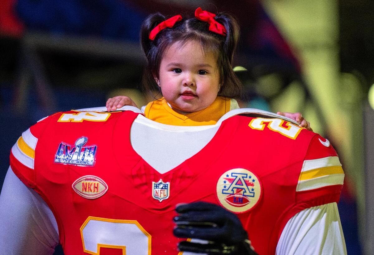 Kansas City Chiefs fans including one-year-old Ayla Hernandez of Pasadena, Calilf, took in the Super Bowl Experience with her parents and grandparents on Thursday, Feb. 8, 2024, in Las Vegas, Nevada.