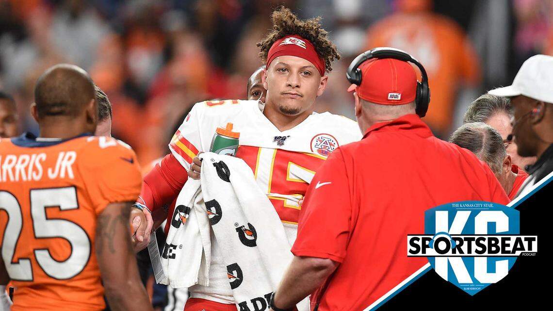 Kansas City Chiefs quarterback Patrick Mahomes (15) leaves the field after being injured during the first half of game against the Broncos Thursday at Empower Field at Mile High in Denver.