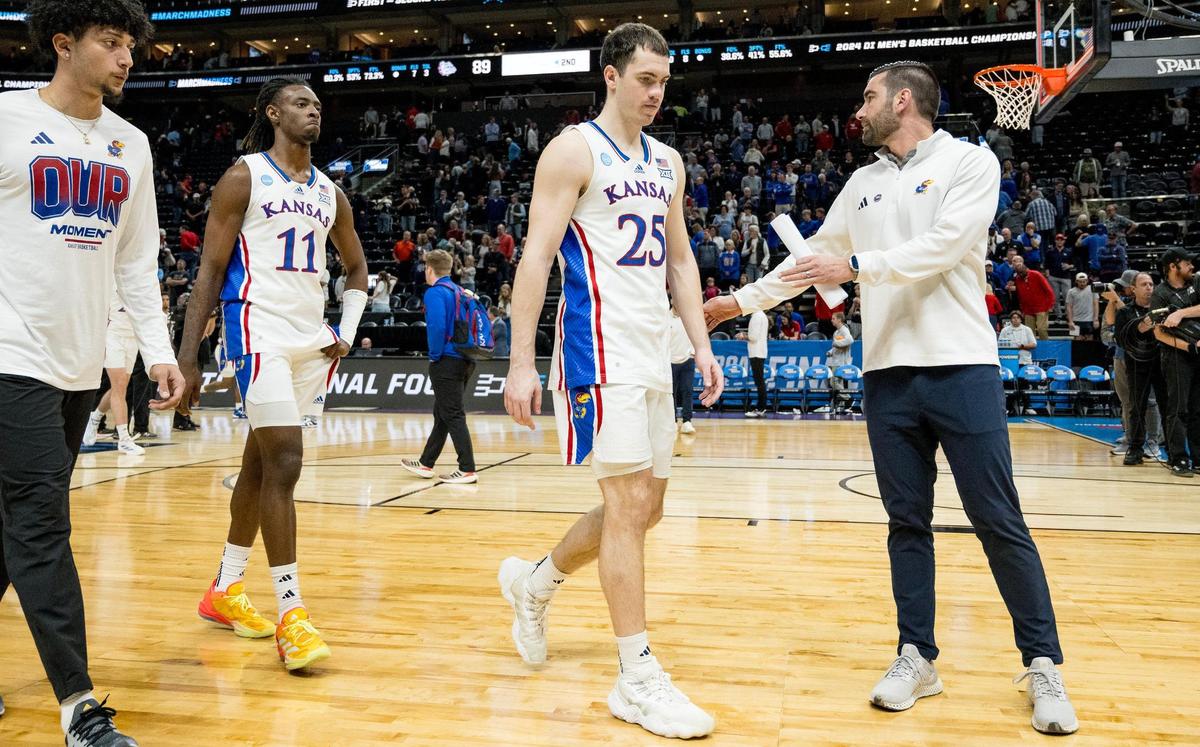 Kansas Jayhawks guard Nicolas Timberlake (25) and guard Jamari McDowell (11) walk off the court after the Gonzaga Bulldogs defeated Kansas 89-68 in a men’s college basketball game in the second round of the NCAA Tournament on Saturday, March 23, 2024, in Salt Lake City, Utah.
