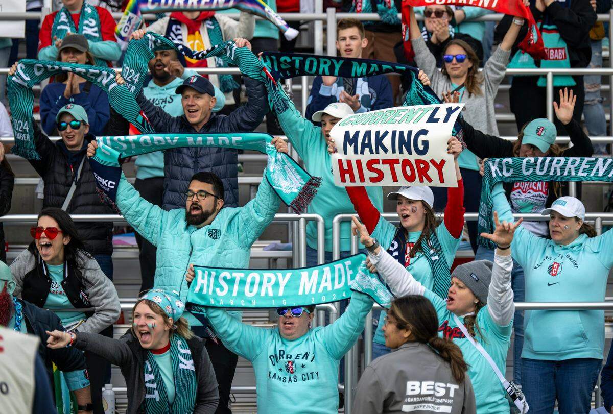 Fans cheer the KC Current’s 5-4 win over the Portland Thorns in the debut match for CPKC Stadium on Saturday, March 16, 2024, in Kansas City.