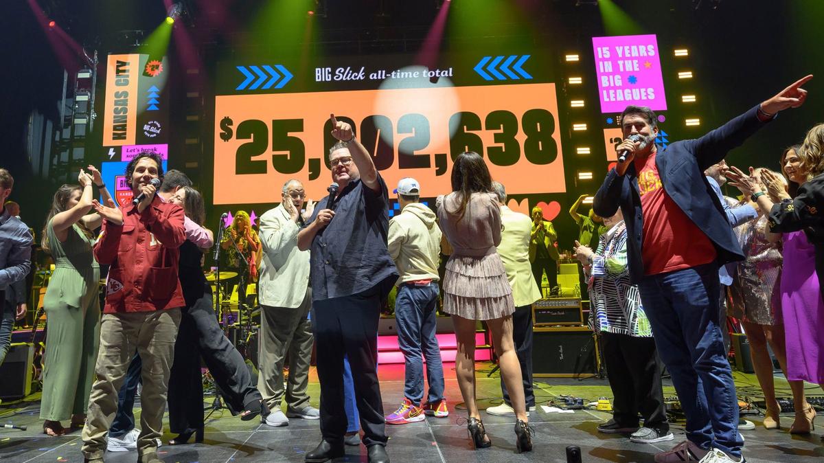 From left, Paul Rudd, Eric Stonestreet and Rob Riggle thank last year’s Big Slick crowd after announcing that since it started in 2010, Big Slick has raised over $25 million for Children’s Mercy. Last year alone, the event raised almost $4 million, a record.