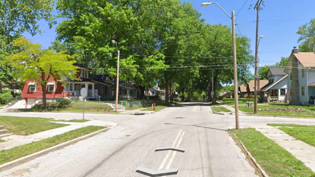 The intersection of Woodland Avenue and East 57th Street, captured by Google Earth on June 19, 2023. A police SUV struck a vehicle at this intersection, injuring the driver, after the driver allegedly failed to stop at a stop sign.
