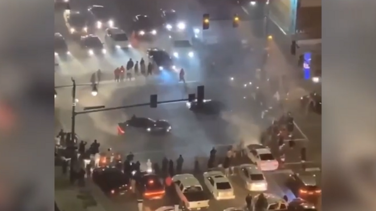 Motorist were filmed blocking a downtown intersection in front of the T-Mobile Center in December 2020 where they performed stunts. Kansas City police say they are cracking down on the illegal activity.