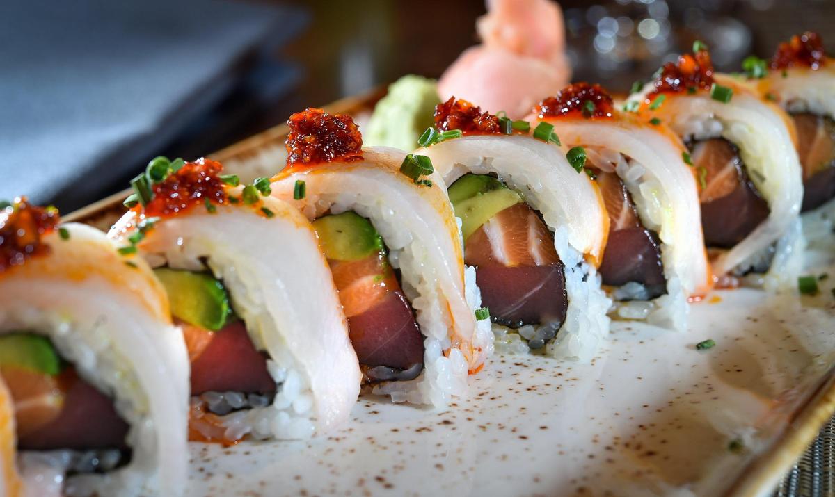 Ocean Roll featuring tuna, salmon, hamachi, avocado and chili garlic oil at Ocean Prime in Kansas City.