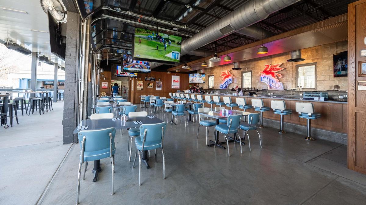 Hank’s Garage and Grill will open in Shawnee on Thursday, March 20. The new restaurant and bar is from the same group that owns King G Bar & Deli and Jim’s Alley Bar in Kansas City’s Crossroads.