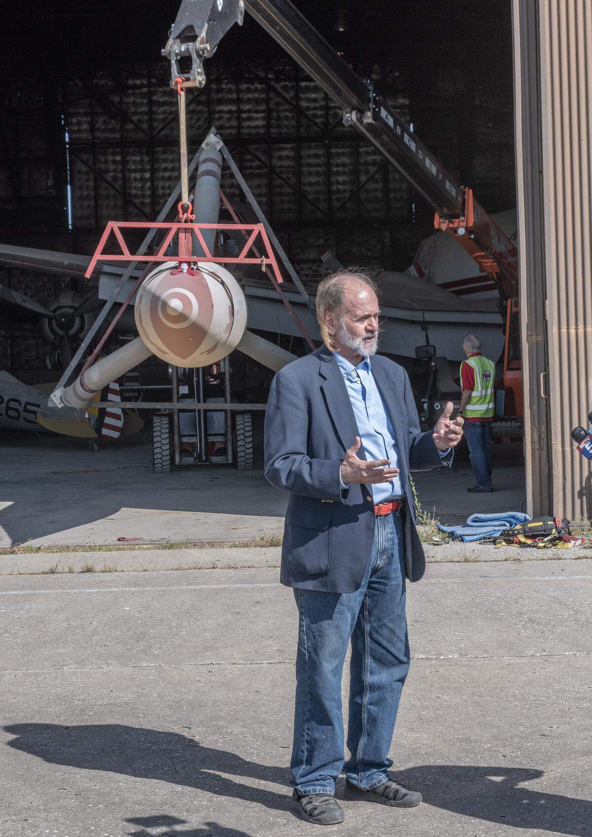 Dan Viets, Columbia, Missouri, owner of the TWA Moonliner II, talked about the replica rocket during Saturday's move. When the rocket was retired from display at the TWA headquarters in 1970, it founds its way to a display at a travel trailer company in Concordia, Missouri. Viets bought if from there, had it restored, and then loaned it to the Airline History Museum. With the shutdown of the Airline History Museum, he is now loaning it to the TWA Museum.