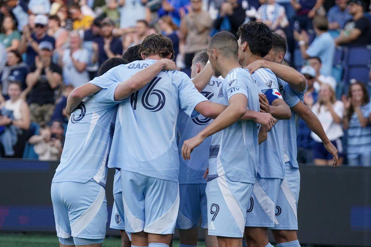 Sporting Kansas City players celebrate after an own-goal by the L.A. Galaxy during a Sunday, May 4, 2025 Major League Soccer match at Children’s Mercy Park in Kansas City, Kansas.