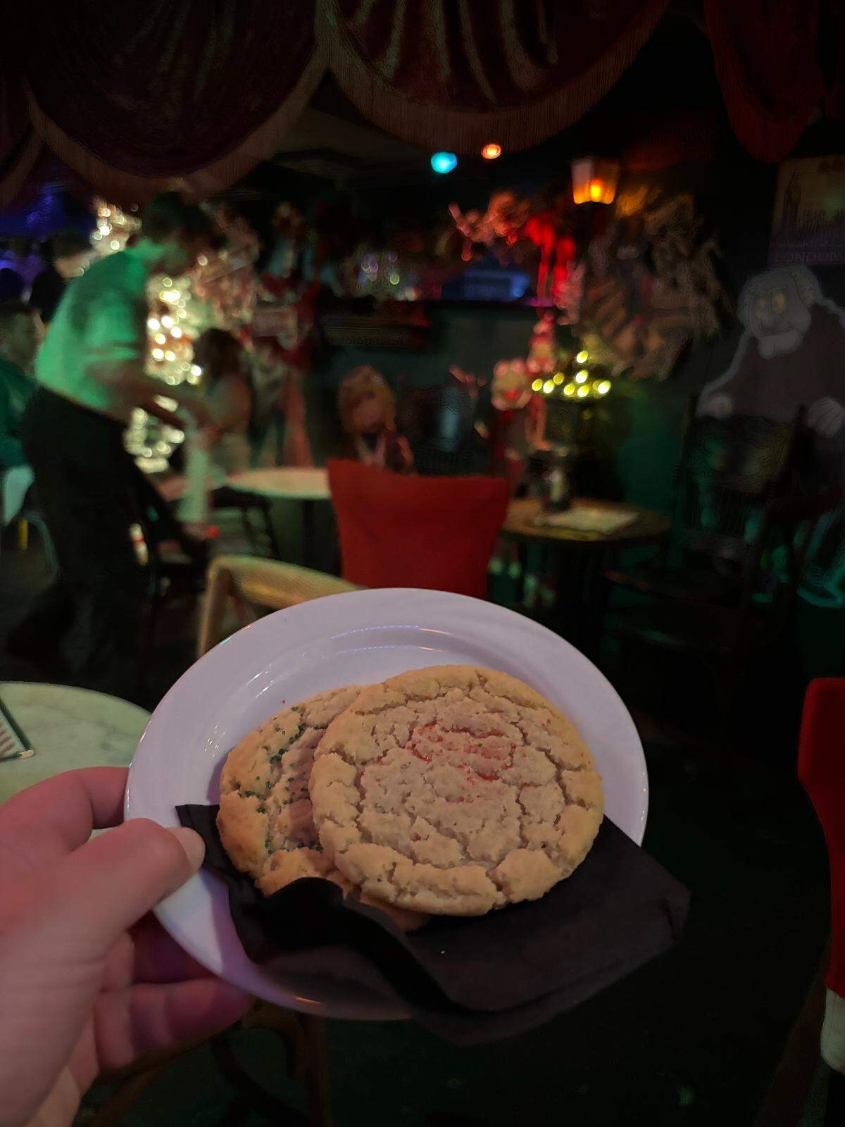 Sugar cookies are a Christmas-themed dessert at the Christmas-themed pop-up bar inside of Tom’s Town in the Crossroads on Dec. 4.