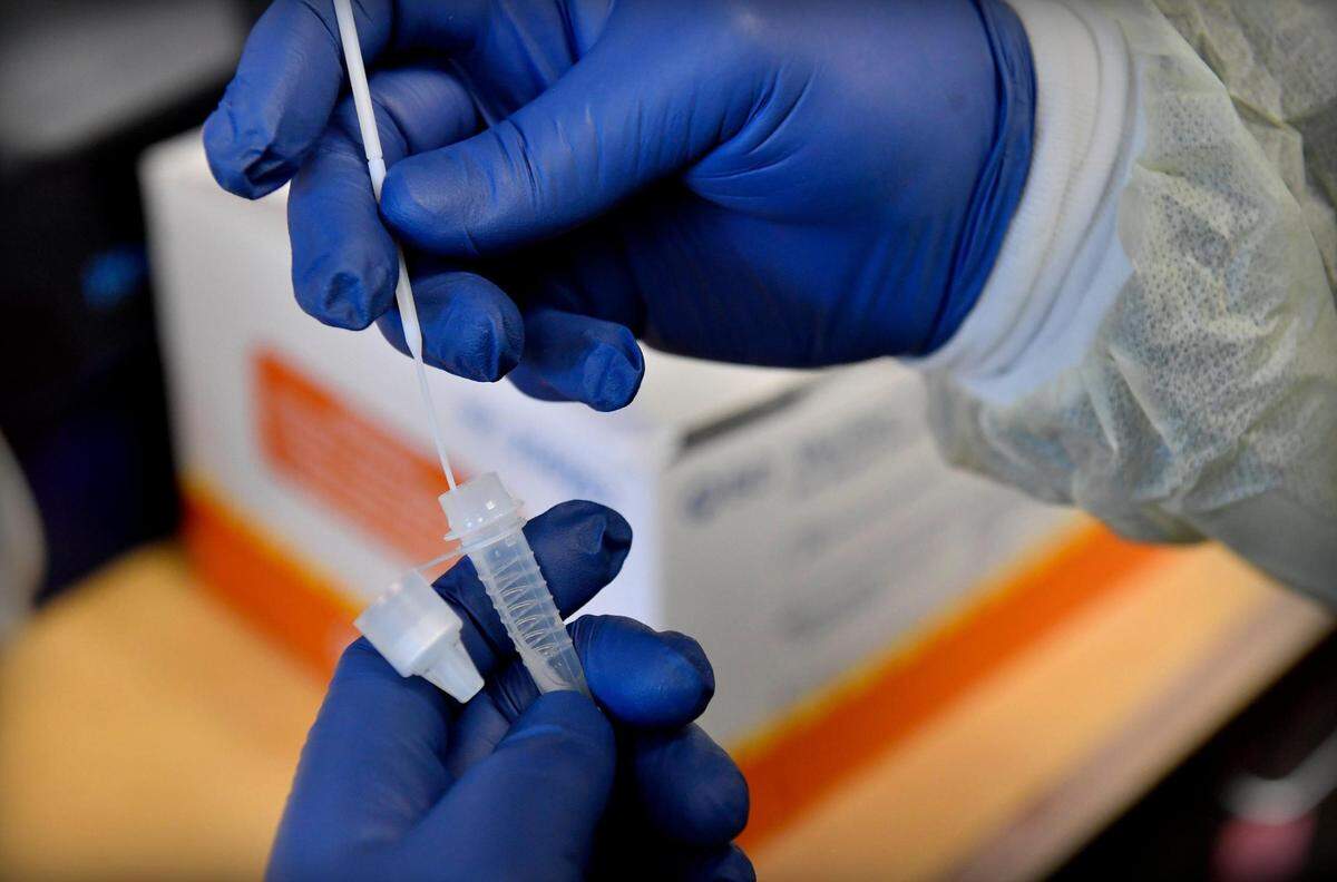 The Family Health Care Clinic in Kansas City, Kansas, processes COVID-19 tests in its lab.