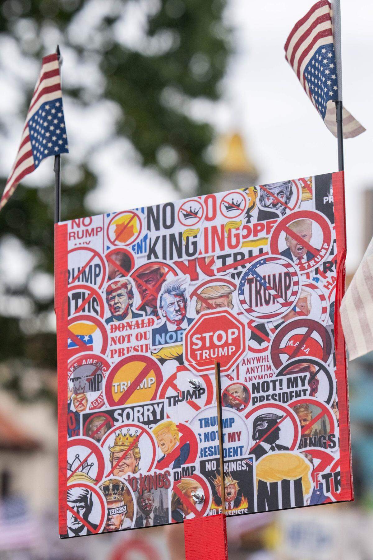 A protest sign on Saturday, October 18, 2025, at Mill Creek Park in Kansas City as part of nationwide “No Kings” protests against the Trump administration.