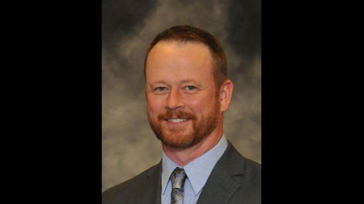 Sgt. David Toland is charged with aggravated battery for allegedly attacking an inmate in the Wyandotte County Detention Center. He is also a school board member in Bonner Springs. 