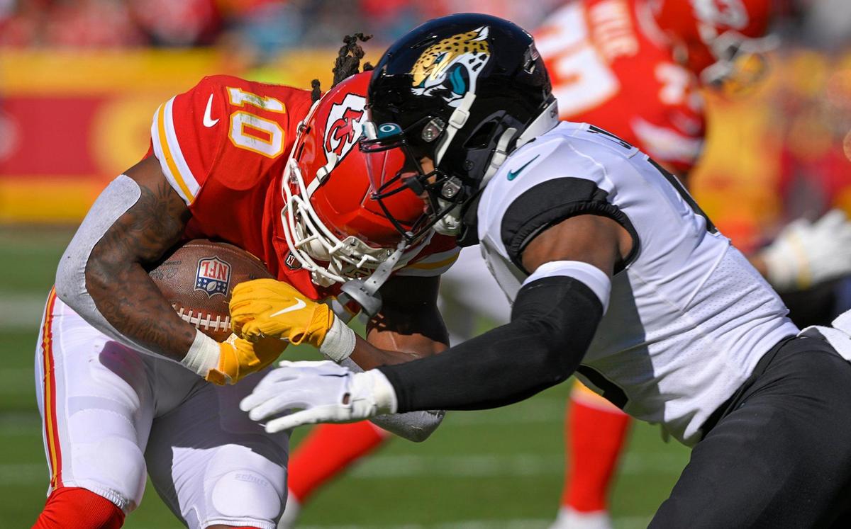 Kansas City Chiefs running back Isiah Pacheco (10) runs for a first down as during the first half against the Jacksonville Jaguars safety Andre Cisco (5) goes after him on Sunday, Nov. 13, 2022, at Arrowhead Stadium in Kansas City.