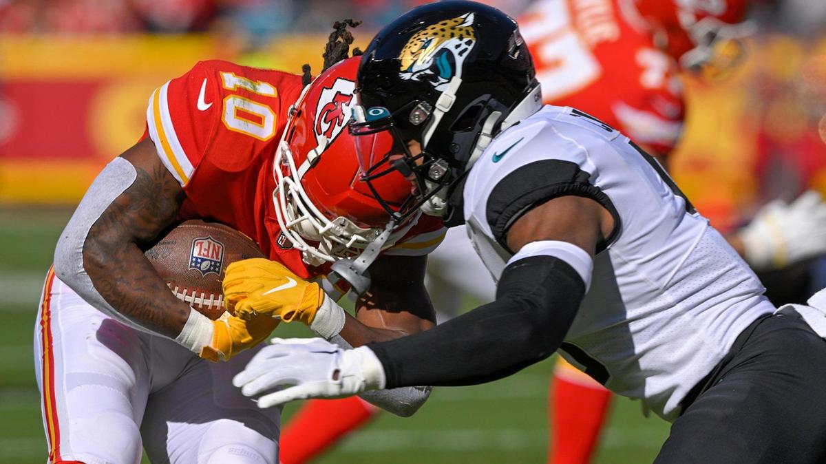 Kansas City Chiefs running back Isiah Pacheco (10) runs for a first down as during the first half against the Jacksonville Jaguars safety Andre Cisco (5) goes after him on Sunday, Nov. 13, 2022, at Arrowhead Stadium in Kansas City.