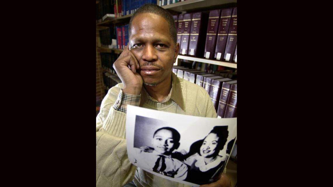 Alvin Sykes sought justice not only in the 1980 killing of Kansas City musician Steve Harvey but also in the 1955 slaying of 14-year-old Emmett Till in Mississippi. Sykes held a photo of Emmett and his mother, Mamie Till-Mobley.