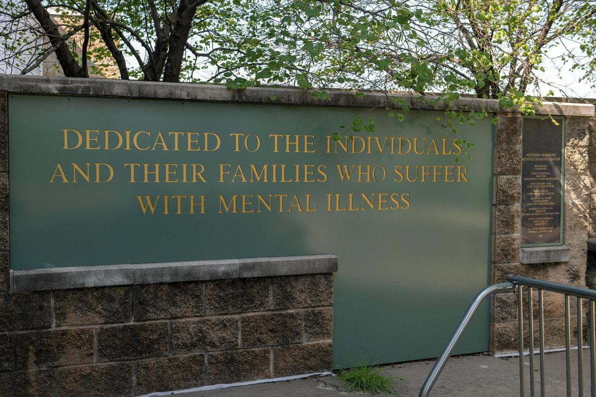 A plaque dedicated to individuals with mental illnesses is seen at the entrance of Center for Behavioral Medicine on Tuesday, Aug. 8, 2023, in Kansas City.