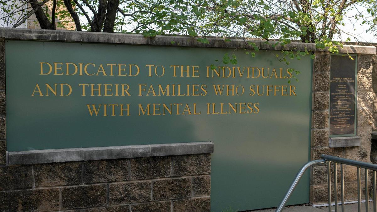 A plaque dedicated to individuals with mental illnesses is seen at the entrance of Center for Behavioral Medicine on Tuesday, Aug. 8, 2023, in Kansas City.
