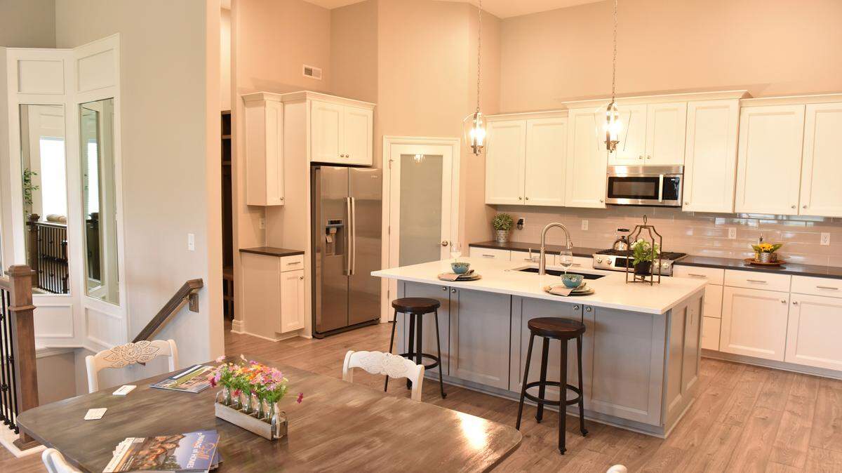 The gourmet kitchens at The Greens of Chapel Creek Townhomes offer upgraded appliances and plenty of space. 