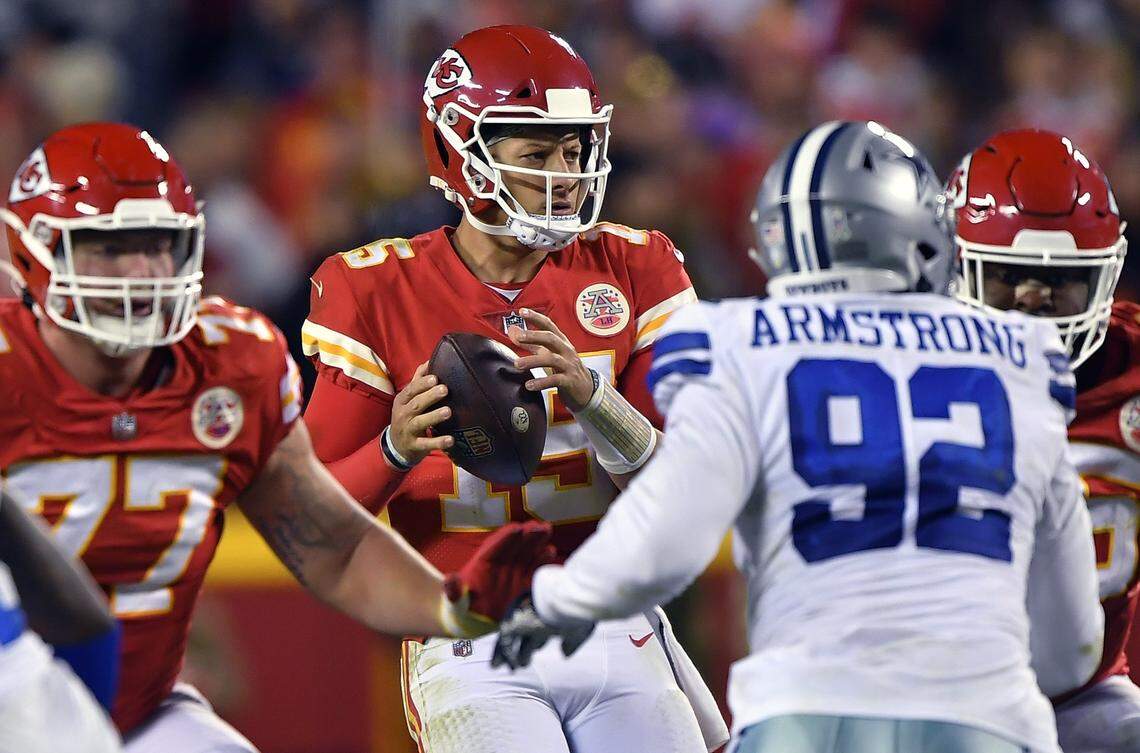 Kansas City Chiefs quarterback Patrick Mahomes (15) looks for a receiver during the second-half of the Dallas-Kansas City game on Sunday, Nov. 21, 2021 at Arrowhead Stadium in Kansas City.