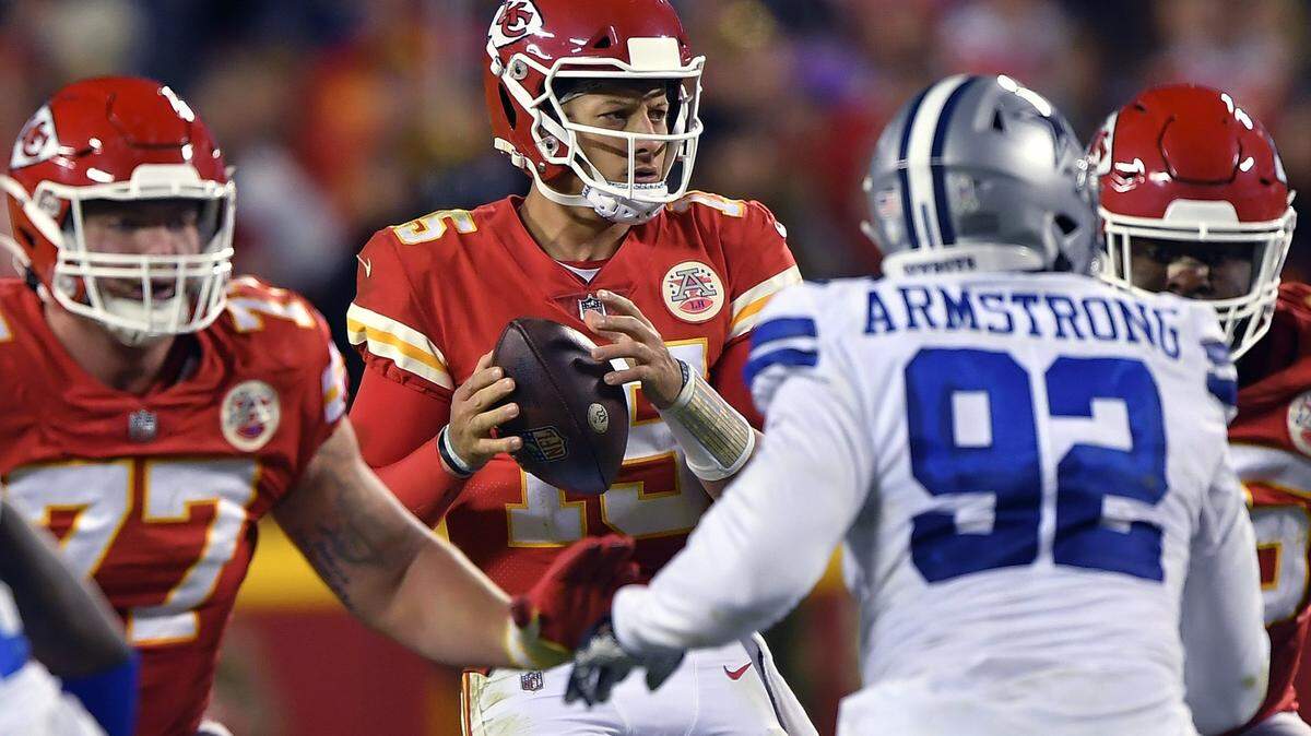 Kansas City Chiefs quarterback Patrick Mahomes (15) looks for a receiver during the second-half of the Dallas-Kansas City game on Sunday, Nov. 21, 2021 at Arrowhead Stadium in Kansas City. 