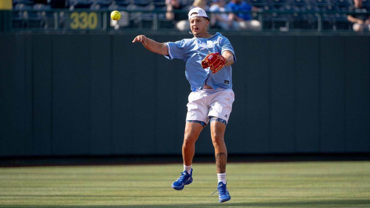 Kansas City Chiefs quarterback Patrick Mahomes throws the ball to first base during the Big Slick celebrity softball game at Kauffman Stadium on Friday, June 2, 2023, in Kansas City.
