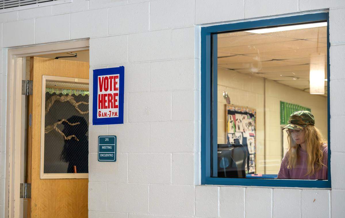 A voter casts their ballot at the Tony Aguirre Community Center during Election Day on Tuesday, April 7, 2026, in Kansas City.