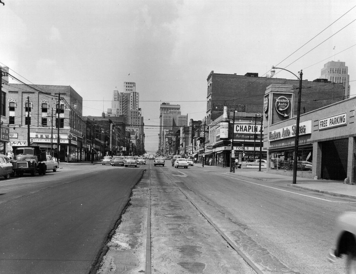 Looking north on Grand Boulevard in downtown Kansas City, the tracks of the last of the streetcars that the city would see for several decades could be seen in this photo made on July 19, 1957.
